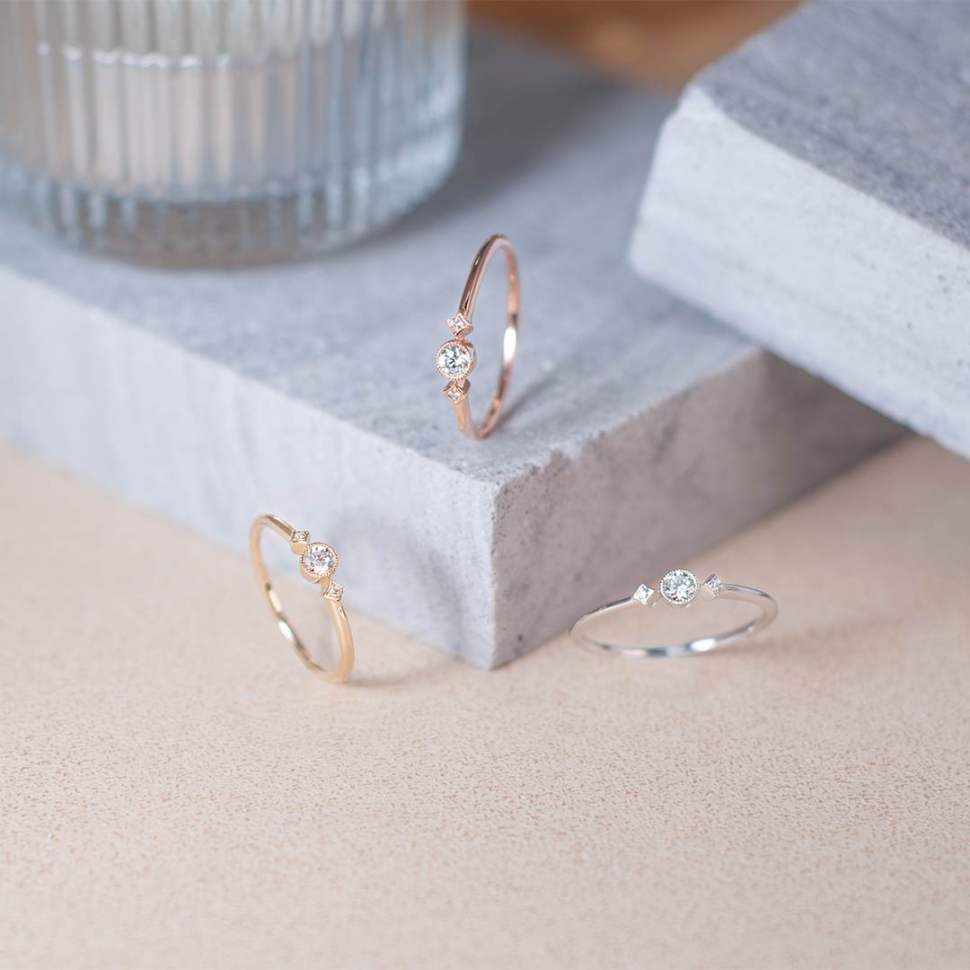 Mini beads tri-stone diamond ring